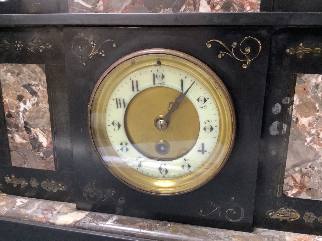 A French marble insert black slate mantle timepiece, early 20th century